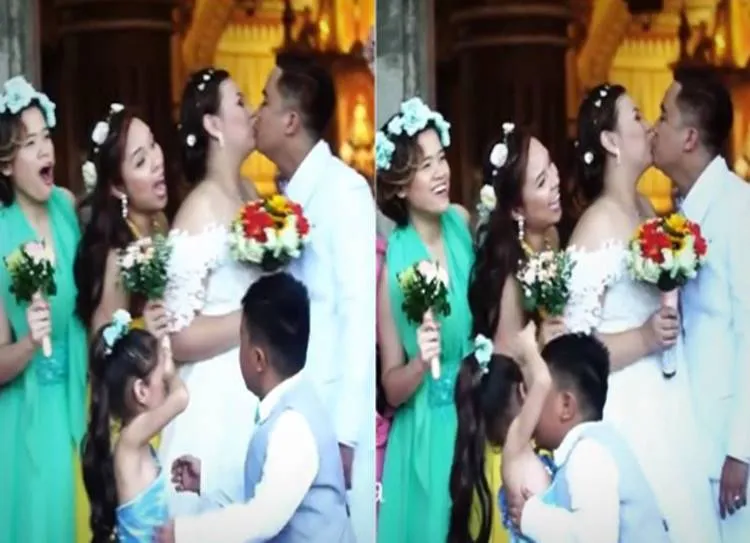 page boy kisses flower girl