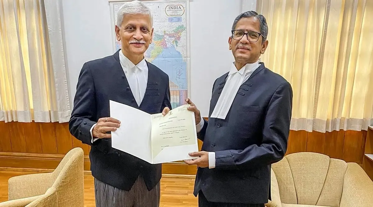 Chief Justice of India N V Ramana (right) with Justice Uday Umesh Lalit during a meeting, in New Delhi, Aug. 4, 2022. (PTI)