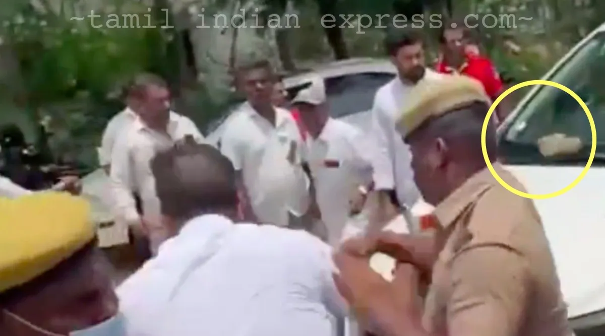 Madurai bjp members throw slippers at minister PTR car
